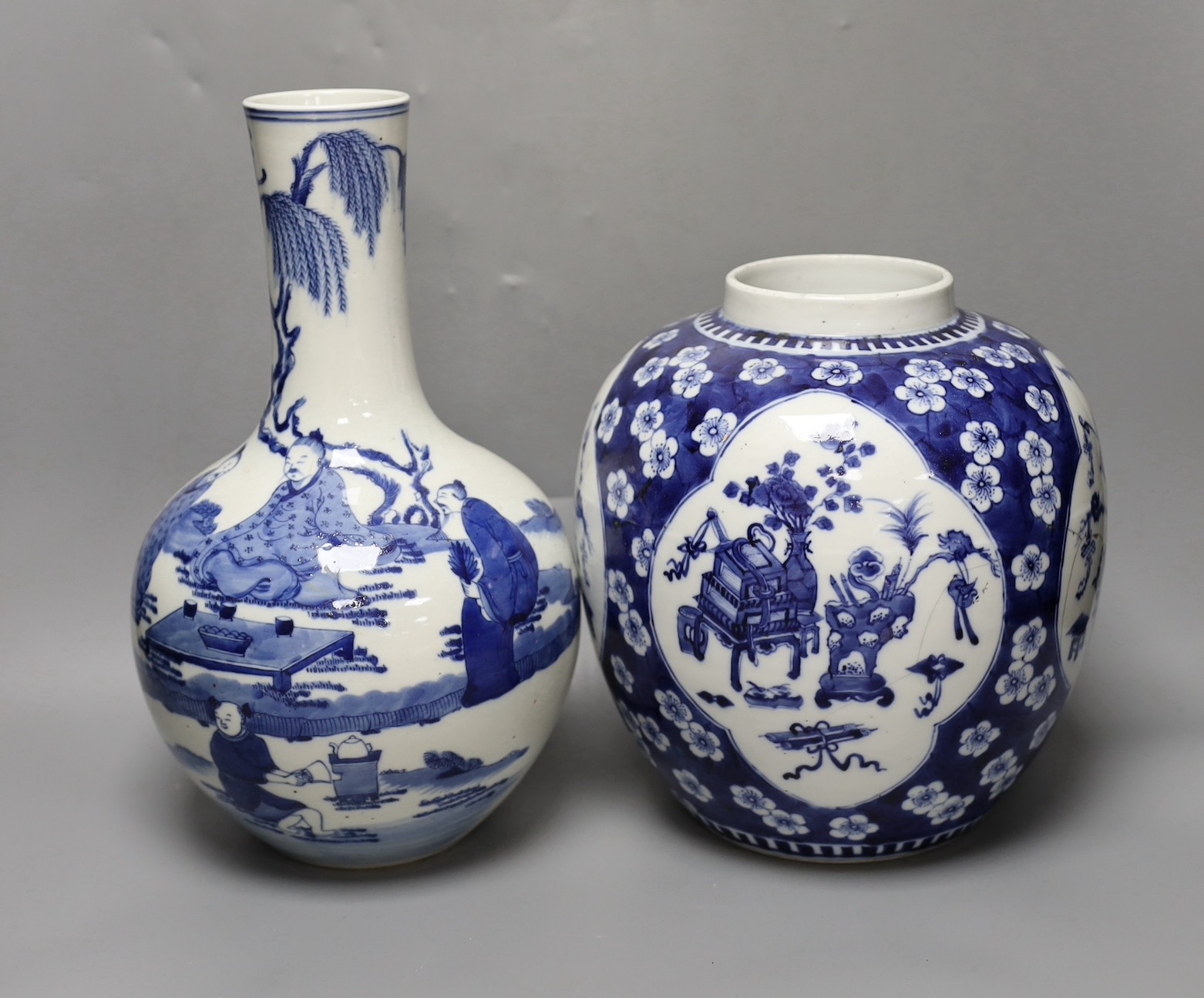 A Chinese blue and white ‘Antiques’ jar, early 20th century and a Chinese blue and white bottle vase, tallest 35cm